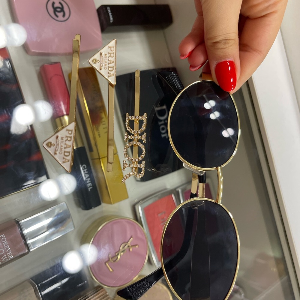 Dior and prada hair clips